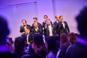 A capella group performing